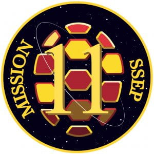 Terps in Space Mission 11 patch consisting of a UMD shell floating in space